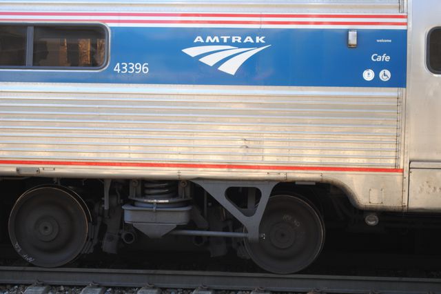 A stock image of the side of an Amtrak train.